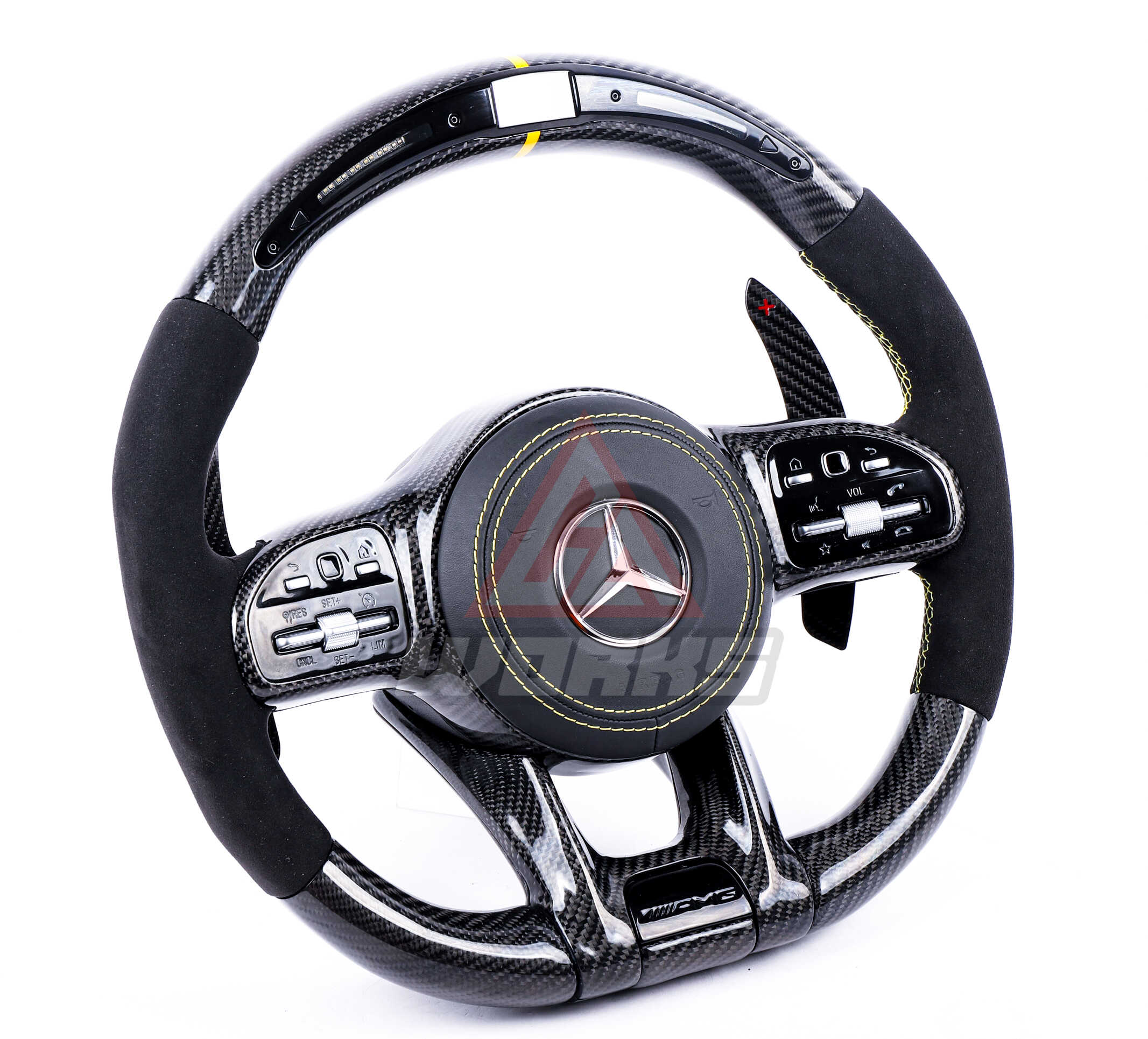 A 2019+ generation mercedes amg steering wheel, customized in gloss black carbon fiber, black alcantara side grips, black nappa leather airbag with yellow stitching, extended design carbon paddle shifters and led shift lights.